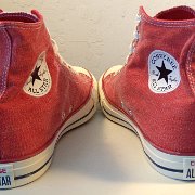 2017 Red Stonewashed High Top Chucks  Angled rear view of 2017 red stonewashed canvas high tops.